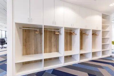We produced bespoke wardrobes, as well as lockable cabinets for the workstations.