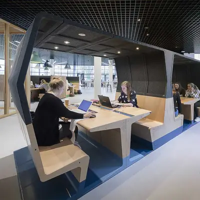 Modern open-plan office space often contains a variety of sound insulating boxes